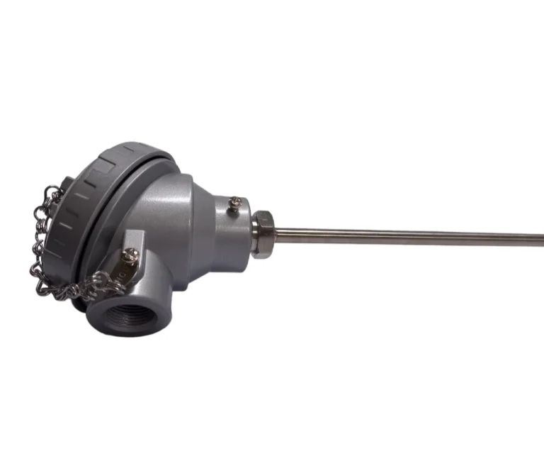 Thermocouple with a large cast terminal head and chained cap